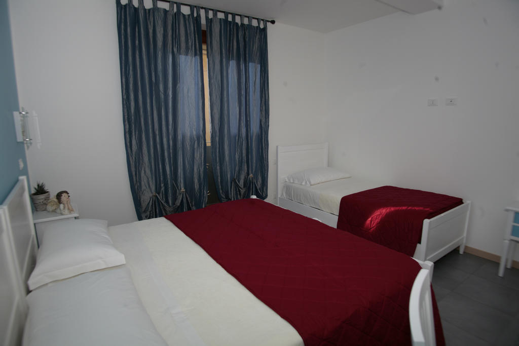 Bed & Breakfast Nettuno Comun Nuovo Pokoj fotografie